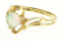 10K Yellow Gold Trillion Sim. Opal Diamond Accent Bypass Ring