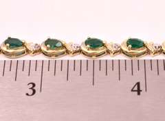 Darling Emerald and Diamond Ring in Yellow Gold