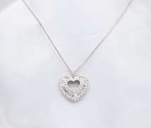 Elegant Diamond Heart Necklace with Baguette and Round Diamonds