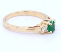 Stunning Yellow Gold Oval Emerald nad Diamond Side Ring
