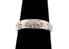 LADIES 18K WHITE GOLD DIAMOND BAND SATIN FINISH.
