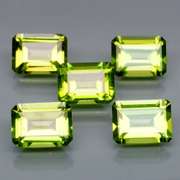 Emerald cut Unheated! 7.65ct Peridot set