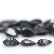 Heated only! 10.83ct blue green Sapphire set