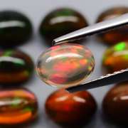 Beautiful 5.24ct 9 piece Ethiopian black opal set