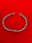 LADIES 14K GOLD DIAMOND AND TANZANITE BRACELET