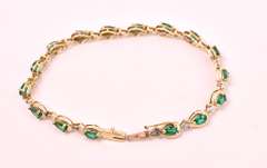 Darling Emerald and Diamond Ring in Yellow Gold