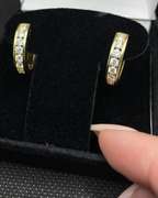 STUNNING 18K YELLOW GOLD OVAL DIAMOND HOOP EARRINGS WITH 7.41 CARATS T.W. OF ROUND BRILLIANT DIAMONDS