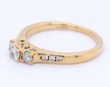 Charming Yellow Gold 3 Stone Diamond Ring