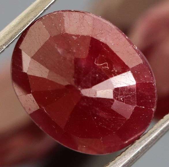 Heavy 17.16ct oval cut Ruby set