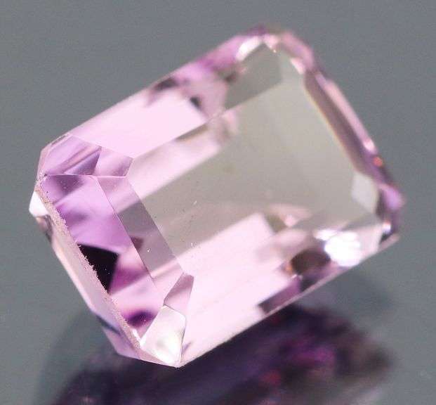 Bright violet 6.36ct emerald cut Amethyst