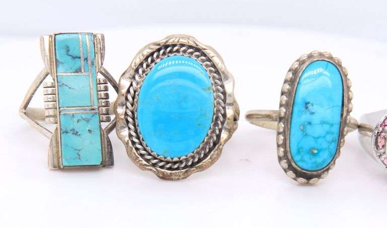 Group lot of 4 vintage 925 sterling silver turquoise rings