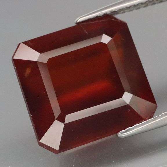 High grade 11.98ct red orange Hessonite Garnet