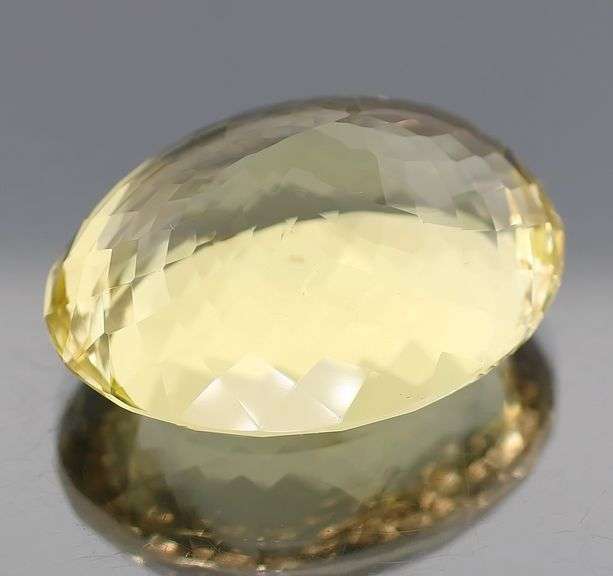 Glistening 128.22ct oval vivid golden Citrine