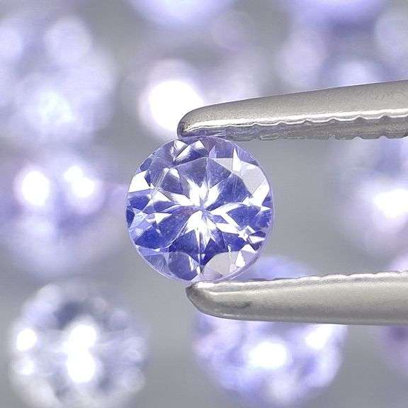 Heavy flashing 3.03ct diamond cut Tanzanite set