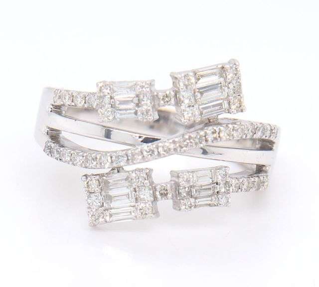 14kt White gold 1ctw princess, round and baguette bypass diamond ring
