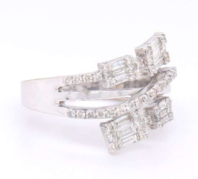 14kt White gold 1ctw princess, round and baguette bypass diamond ring