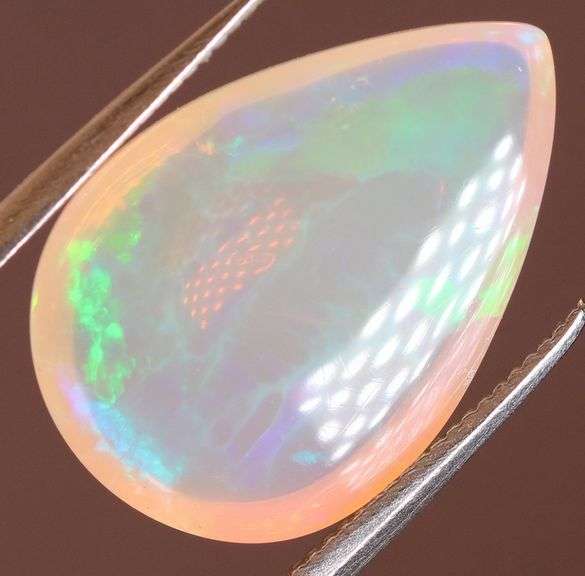 Gorgeous green and indigo flashing 3.72ct Jelly Opal