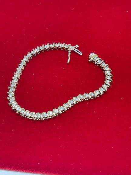 CERTIFIED 14K YELLOW GOLD AND DIAMOND TENNIS BRACELET.
