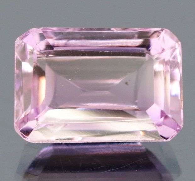 Bright violet 6.36ct emerald cut Amethyst