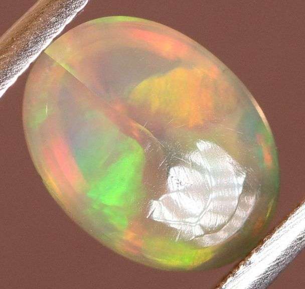 Glowing! 1.20ct full cover floral pattern Jelly Opal