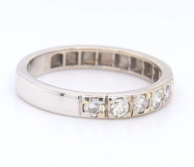 Sparkling White Gold Seven Stone Diamond Band