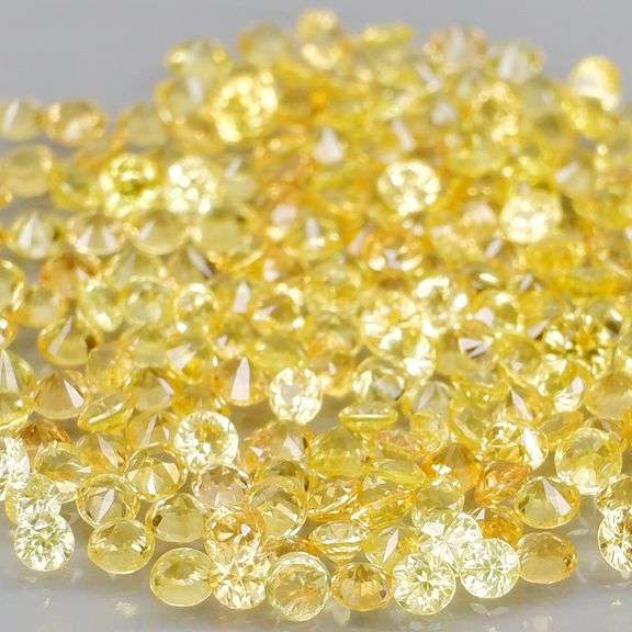 Fantastic 4.71ct diamond cut yellow Sapphire set