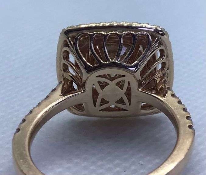 INTRIGUING AND ELEGANT 18K ROSE GOLD DOUBLE HALO CUSHION SHAPED AND CHAMPAGNE DIAMOND ENGAGEMENT RING