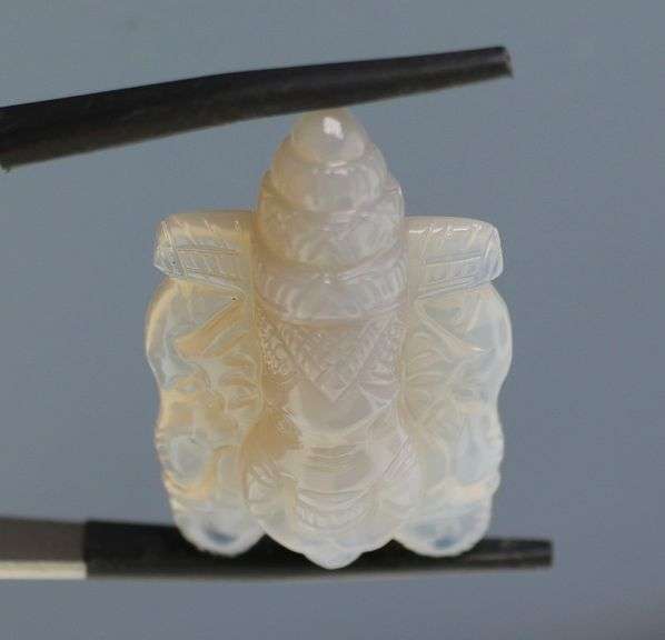 Detailed 30.93ct Chalcedony carving