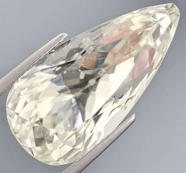 Remarkable 21.89ct high fire platinum blonde Kunzite