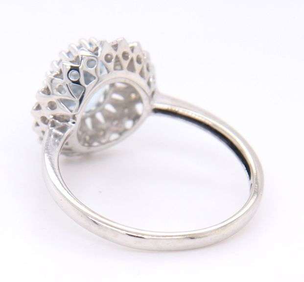 Gorgeous White Gold oval Aquamarine and accent Diamond Halo Ring