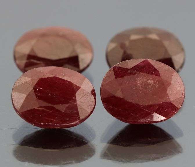 Heavy 17.16ct oval cut Ruby set