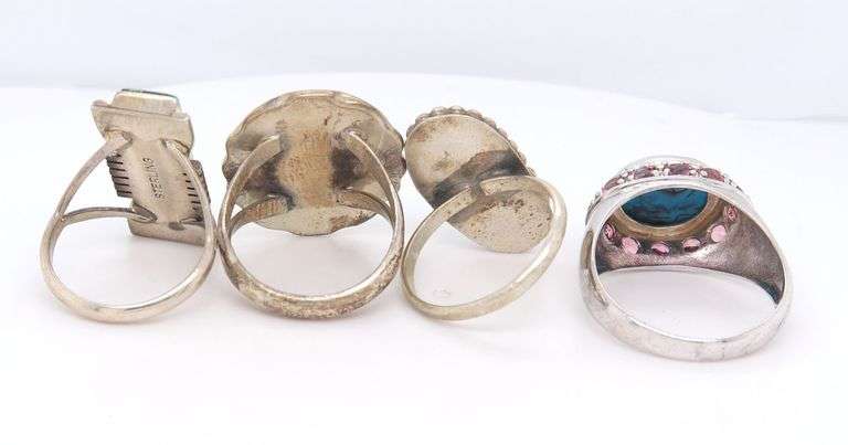 Group lot of 4 vintage 925 sterling silver turquoise rings