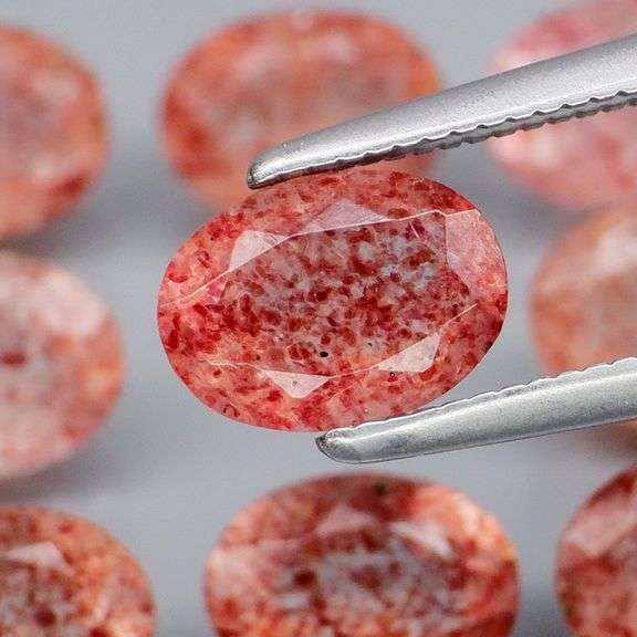 Dazzling 7.26ct faceted Strawberry Quartz set