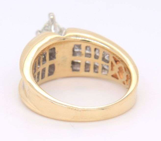 14kt Yellow gold marquoise in 3/4ctw invisible set diamond setting