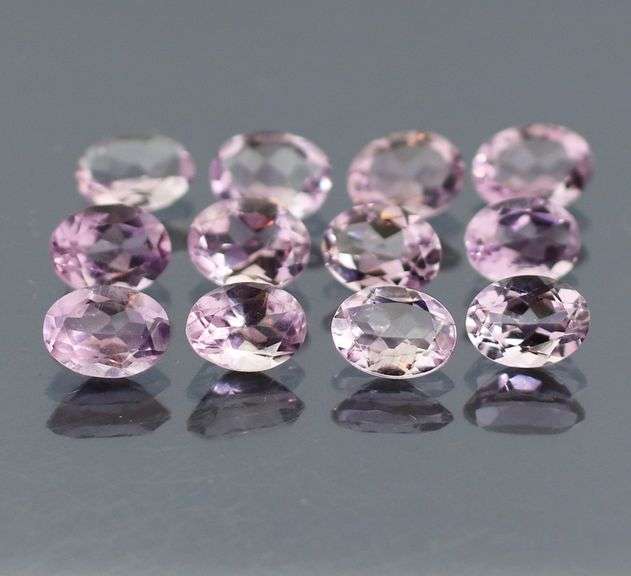 Glittering 12.39ct real Brazilian Amethyst set