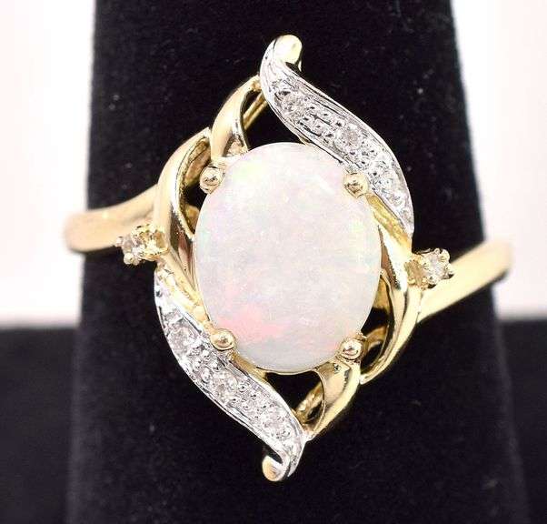 Alluring 10K Yellow Gold approx. 1.18 CTS Opal and Diamond Ring