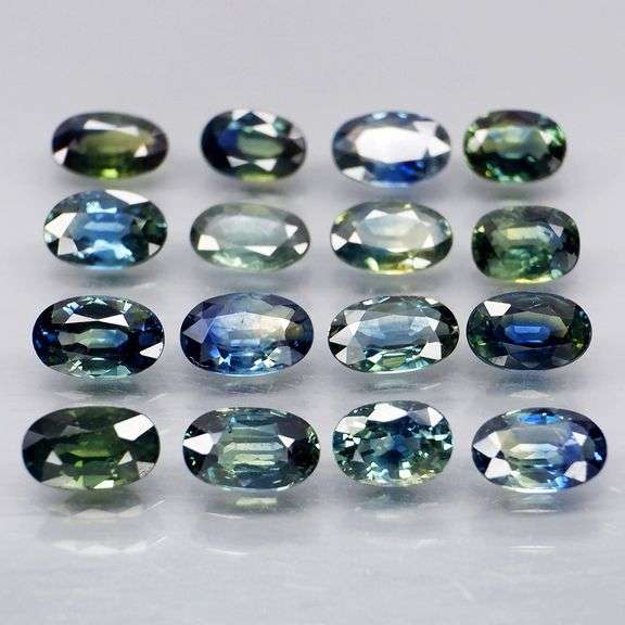 Heated only! 4.99ct blue green sapphire set