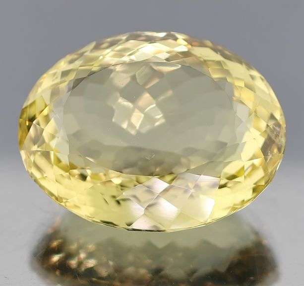 Glistening 128.22ct oval vivid golden Citrine