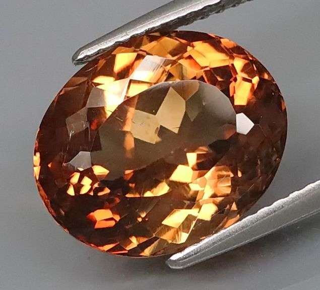 Captivating 7.47ct peach amber Imperial Topaz