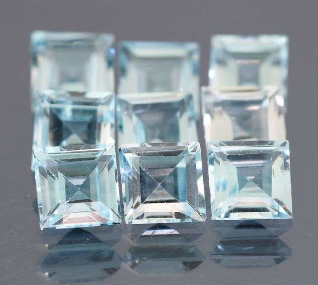 Amazing 12.20ct radiant cut ice blue Topaz set