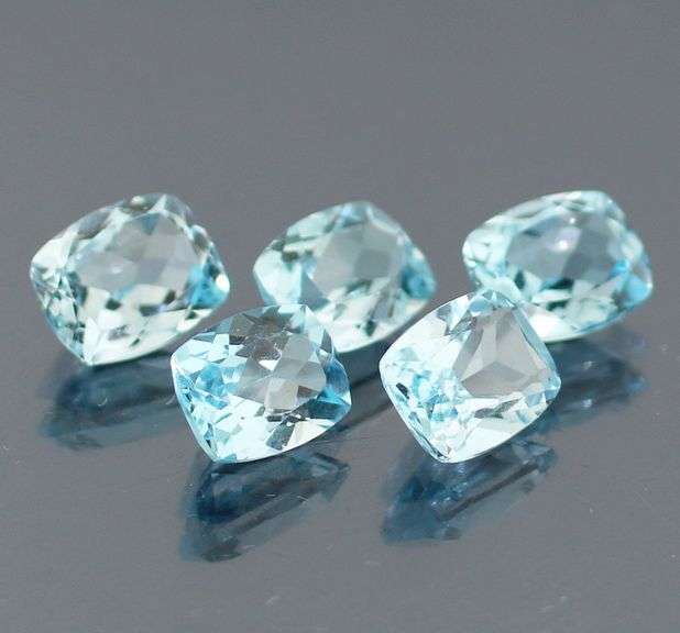 Dazzling 8.58ct vivid blue cushion cut Topaz set