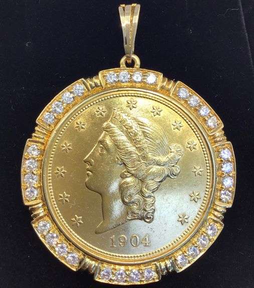 1904 GOLD COIN FRAMED IN 14K YELLOW GOLD AND ROUND BRILLIANT DIAMONDS