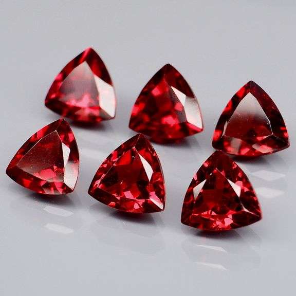 Trillion cut 5.52ct cherry red Garnet set