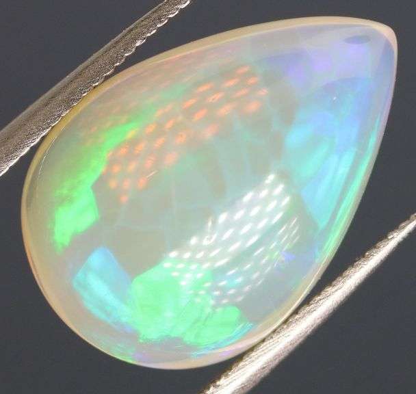 Gorgeous green and indigo flashing 3.72ct Jelly Opal