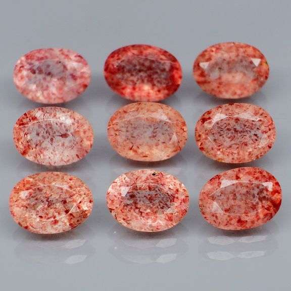 Dazzling 7.26ct faceted Strawberry Quartz set