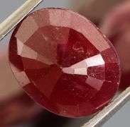 Heavy 17.16ct oval cut Ruby set