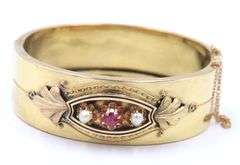 Antique Pearl, Ruby and Enamel Bangle in Yellow Gold