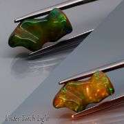 High fire collectors 4.41ct free form black Opal vein