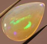 Gorgeous green and indigo flashing 3.72ct Jelly Opal