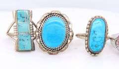 Group lot of 4 vintage 925 sterling silver turquoise rings